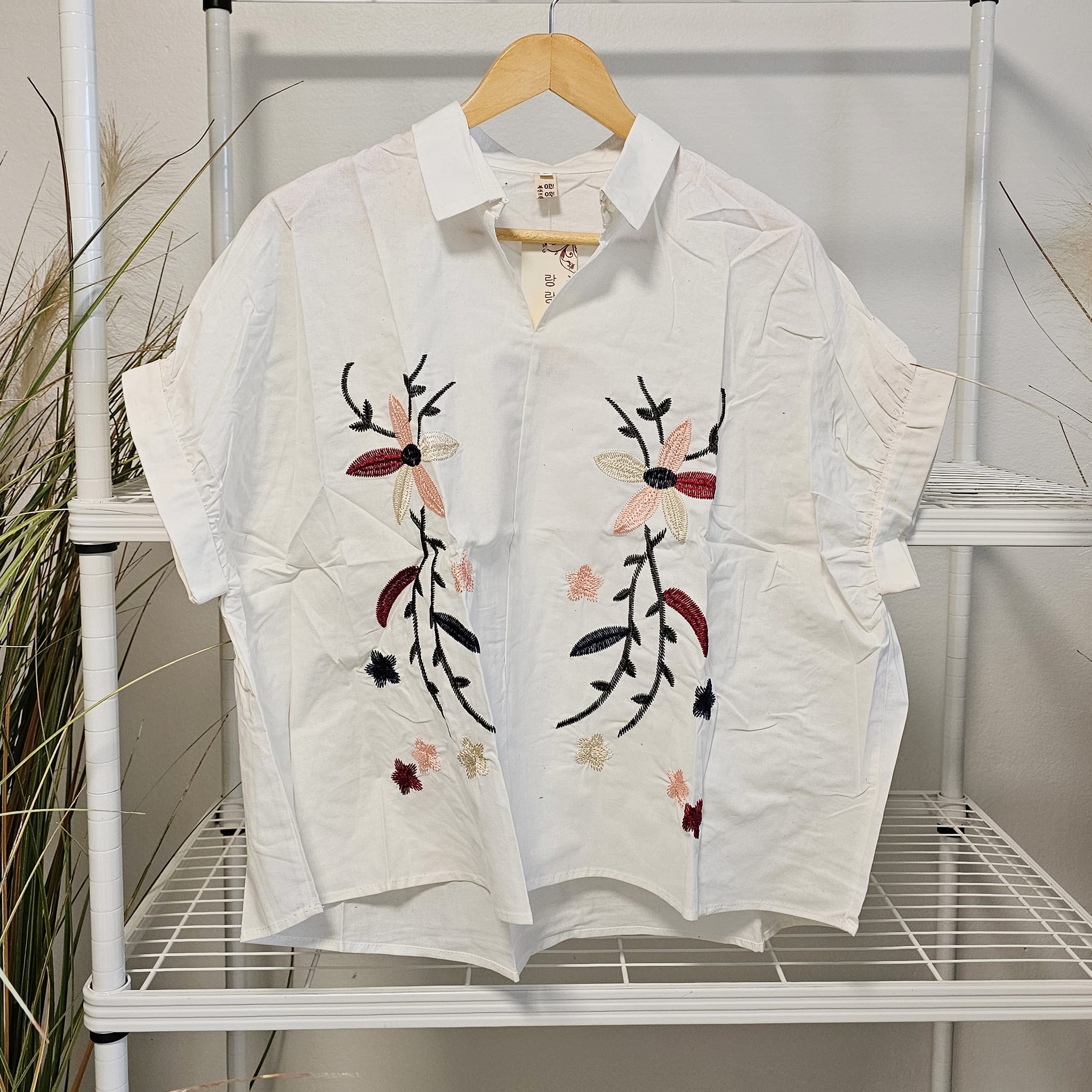 เสื้อฝ้ายปักลายดอกไม้