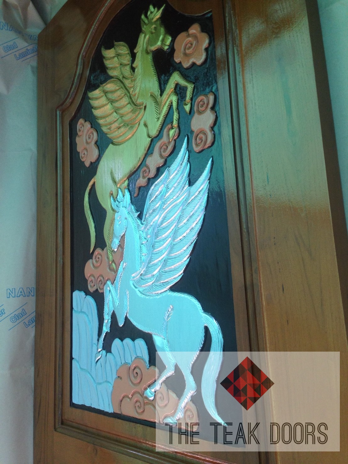 TD122 ประตูไม้สัก ลายอาชา ขนาด 80X200 ซม.