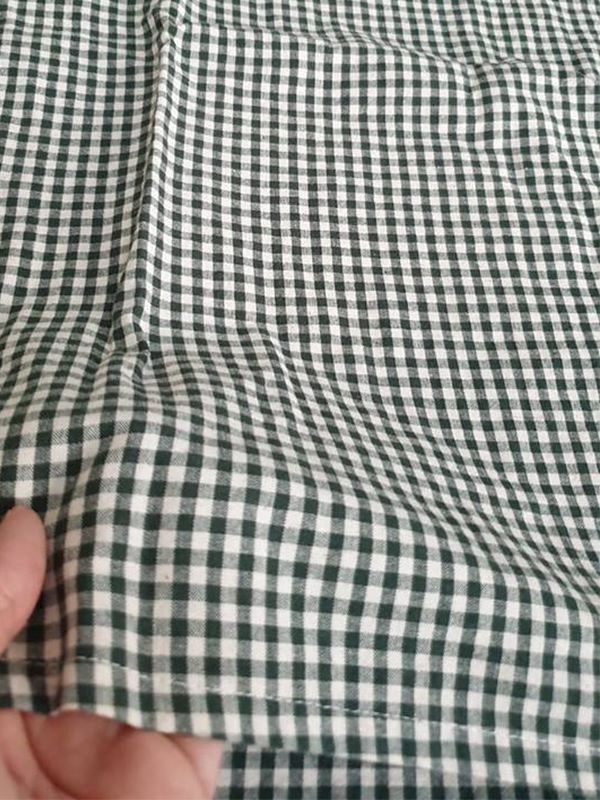 เสื้อผ้าฝ้ายลายสก็อตตัวหลวมสีเขียว